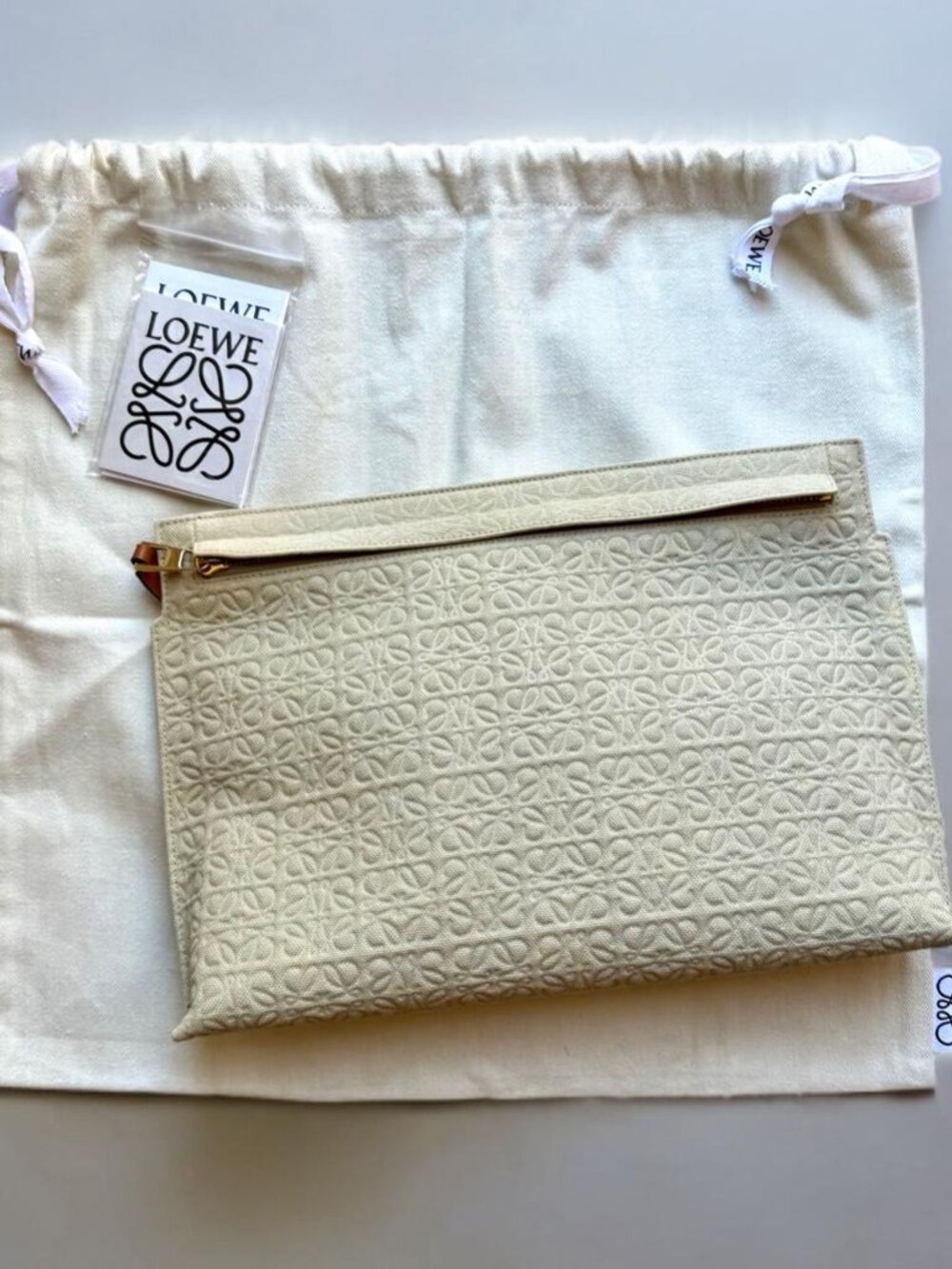 Loewe Neutral Beige Anagram Embossed Canvas T Pouch Clutch Bag